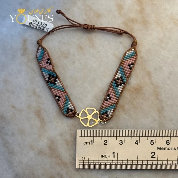 دستبند میوکی گل آفتابی طلا